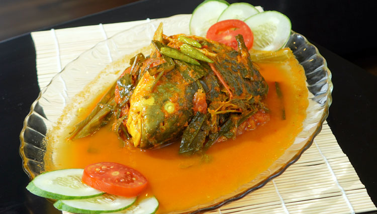 The Gulai Ikan Semah with carp fish head in curry. (PHOTO: Haza Resto & Café)