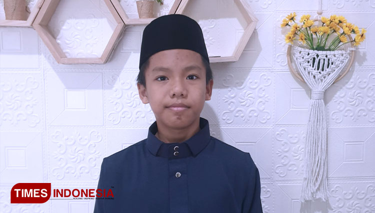 Erland Abdiel Rahman kelas 7 SMPIT Al Uswah Tuban yang hafiz 30 juz (Foto: Ikhwan Fahrudin/TIMES Indonesia)