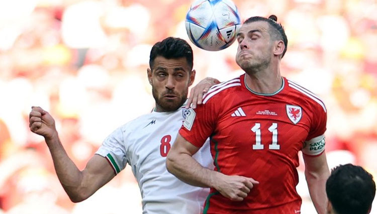 Wales vs Iran di Piala Dunia 2022. (Foto: AFP via Getty Images/Fadel Senna)