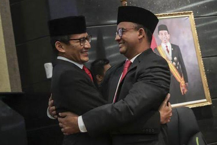 Anies Baswedan saat bersama Sandiaga Uno. (FOTO: CNN)