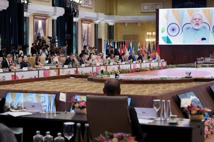 Perdana Menteri India, Narendra Modi saat berbicara melalui televisi kepada para menteri G20 dalam bahasa Inggris, tanda betapa seriusnya dia ingin pesannya diperhatikan. (FOTO: BBC/Reuters)
