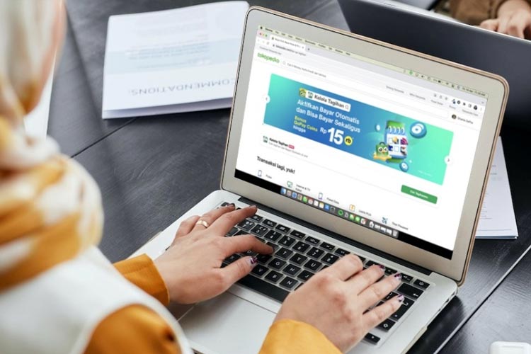 Ilustrasi pengguna aplikasi marketplace Tokopedia.(Dok.GOTO)