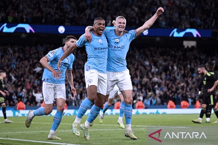 Selebrasi para pemain Manchester City Manchester City berhasil melangkah ke final Liga Champions 2022/23 setelah menang agregat 5-1 atas juara bertahan Real Madrid. (ANTARA/AFP/Oli SCARFF)