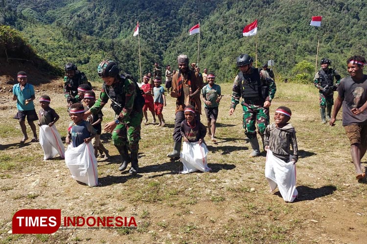 Anak&#45;anak Distrik Yigi Papua Nyaman Berlomba Dikawal Satgas Yonif PR 433/JS