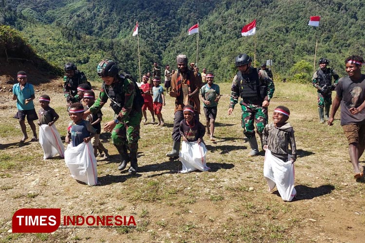 Anak-anak Distrik Yigi Papua Nyaman Berlomba Dikawal Satgas Yonif PR 433/JS