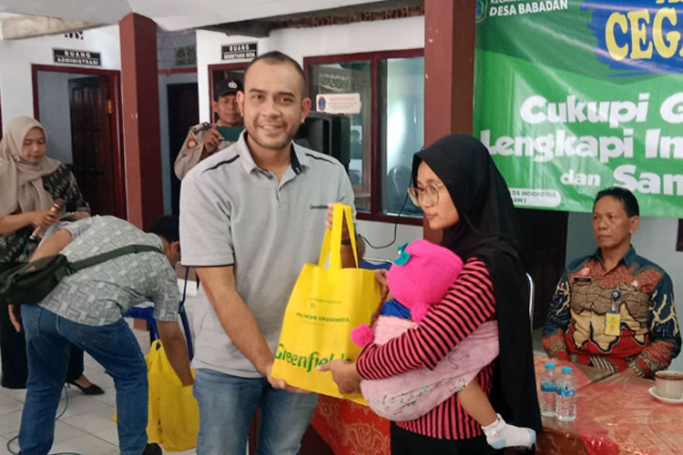 Greenfield Indonesia Salurkan Bantuan Nutrisi untuk Anak dan Ibu Menyusui di Ngajum