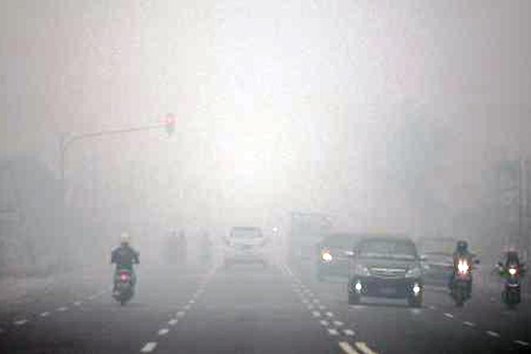 Ilustrasi - Cuaca Diliputi Asap (FOTO: The Guardian)
