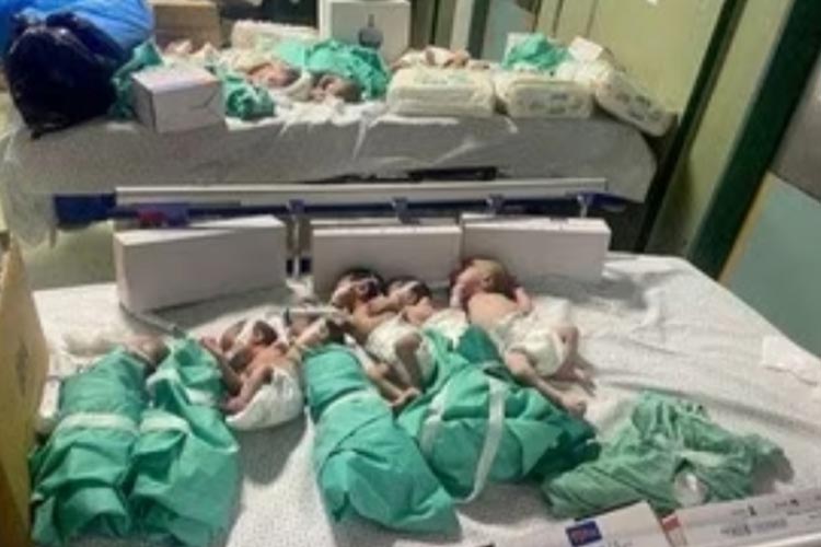 Bayi baru lahir ditempatkan di tempat tidur setelah dikeluarkan dari inkubator di rumah sakit Al Shifa Gaza setelah listrik padam. (FOTO: SWI swissinfo.ch)