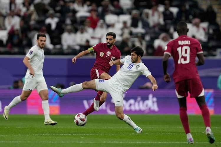 Duel Qatar vs Uzbekistan di perempat final Piala Asia 2023, Sabtu (3/2/2024) malam WIB.(Foto: AP Photo/Thanassis Stavrakis)
