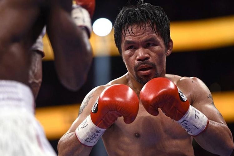 Manny Pacquiao tidak bisa tampil di Olimpiade Paris 2024. (foto: afp)