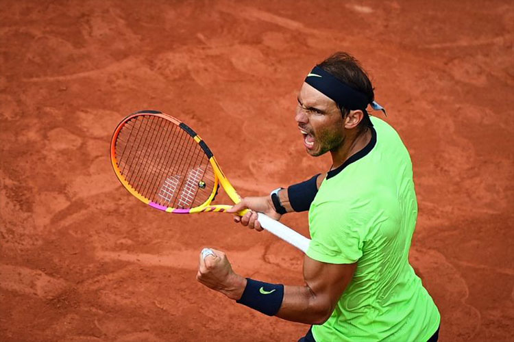 Petenis Spanyol Rafael Nadal. (Foto; AFP/CHRISTOPHE ARCHAMBAULT)