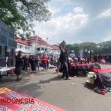 Bantengan dan Demo Buruh Penuhi Alun-alun Tugu Malang