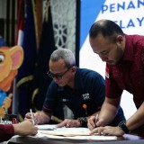 PT Pos Indonesia dan Kantor Imigrasi Kelas I TPI Malang Teken Kerjasama Pelayanan Pengiriman Paspor