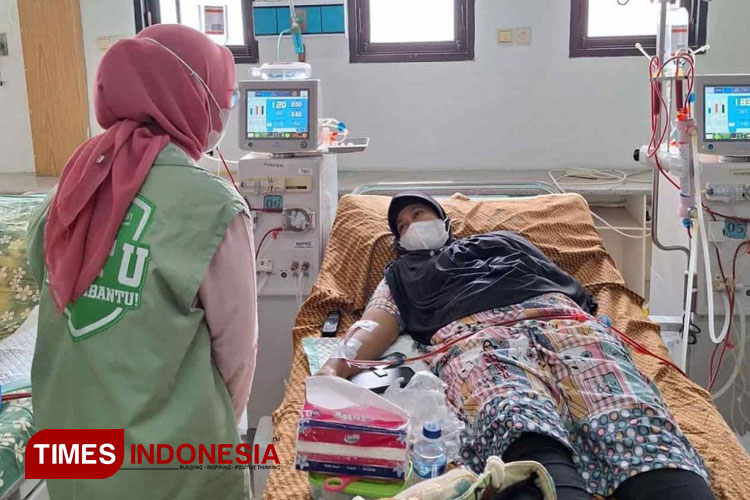 Annisa Atul Hasanah (49), Peserta JKN Penerima Bantuan Iuran (PBI). (FOTO: AJP TIMES Indonesia)