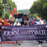 Ikut Karnaval Budaya, Diskominfo Jember Ajak Masyarakat Jauhi Pinjol dan Judol