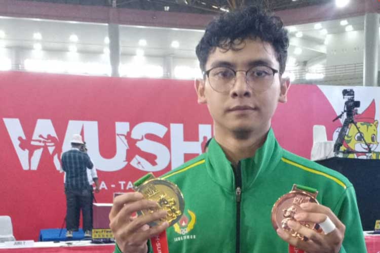 Akbar Persembahkan Medali Emas untuk Kota Batu di Cabor Wushu PON XXI Aceh-Sumut