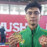 Akbar Persembahkan Medali Emas untuk Kota Batu di Cabor Wushu PON XXI Aceh-Sumut