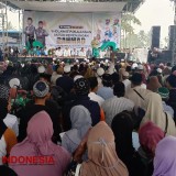 Pilkada Bondowoso 2024, Meski Diguyur Hujan, Ribuan Massa Hadiri Shalawat Kemenangan Paslon Rahmad