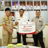 Bank Jatim Serahkan CSR Pengecatan Dinding GOR Sultan Abdul Kadirun ke Pemkab Bangkalan 