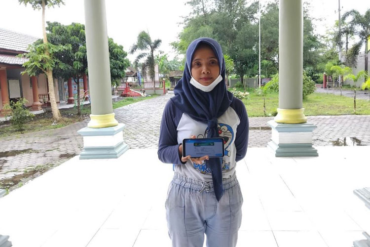 Ifa Fauziana (37), Peserta JKN segmen Pekerja Bukan Penerima Upah (PBPU)/Mandiri. (FOTO: AJP TIMES Indonesia)