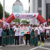 Donasi ke Yayasan Bina Karya Mandiri, Bank Jatim Gelar Jatimers Run To Care 2024