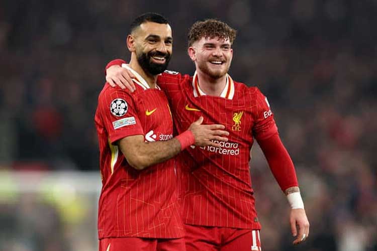 Mohamed Salah dan pemain pengganti Harvey Elliott membawa Liverpool menang 2-1 atas Lille di fase grup Liga Champions.