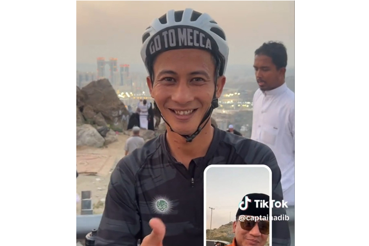 Tangkapan layar video unggahan akun TikTok captainadib, yang berbincang dengan Habibi Nur, saat berada di Mekah dengan sepedanya. (FOTO: Adib Stories)