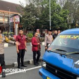 Berbagi Berkah, Puluhan Polisi di Kota Malang Bagi 500 Paket Takjil ke Pengendara