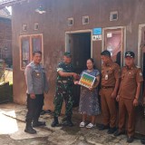Danramil Tajinan dan PDAM Tirta Kanjuruhan Berikan Bantuan Air Bersih untuk Warga Kurang Mampu