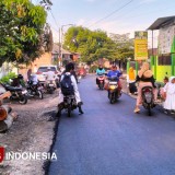 Akhirnya Jalan Dusun Curah Lembu Diaspal pada TMMD di Jember