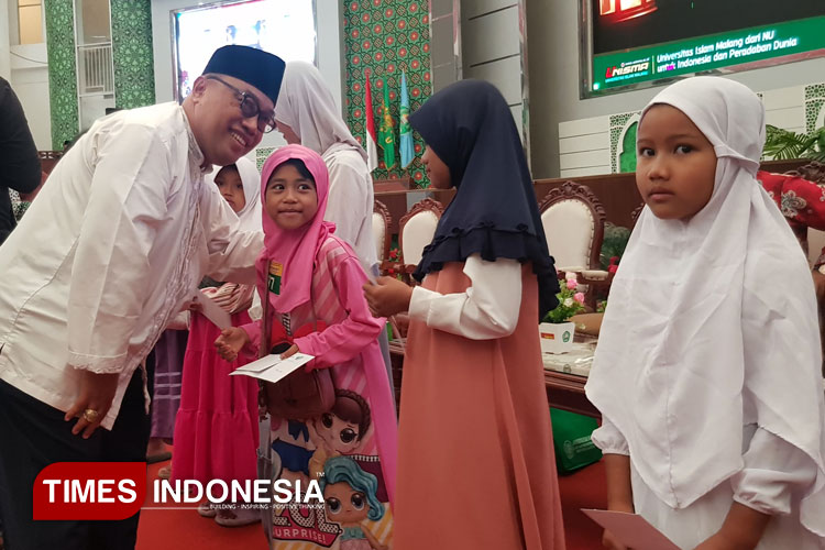 Santunan-anak-yatim-unisma.jpg