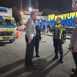 Semalaman, Porsonel Polresta Banyuwangi Lakukan Pengaturan Kemacetan di Pelabuhan Ketapang
