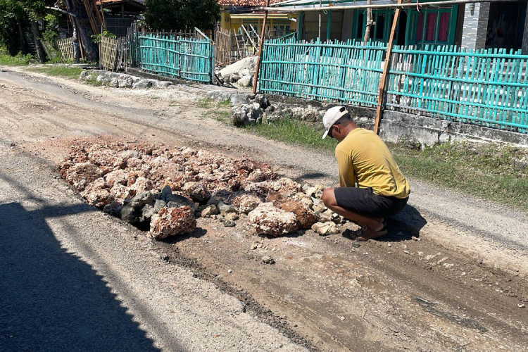 Masyarakat-Raas-bergotong-royong-C-1.jpg