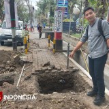 PU SDA Jatim Keruk Sisi Barat Jalan Suhat Kota Malang, Jalanan Tetap Bersih
