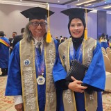 Raih Gelar Doktor Bersama, Sepasang Suami Istri Jadi Wisudawan Terunik di Unitomo