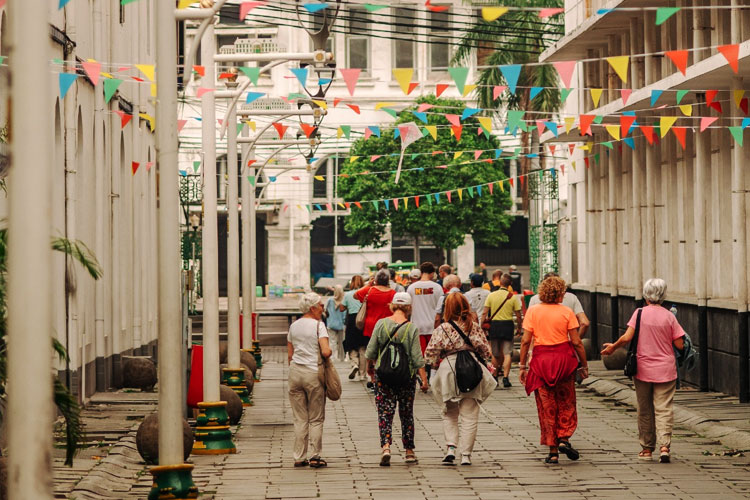 A vibrant Sunday stroll through Jakarta’s Old Town, where history, culture, and community come alive under colorful street decorations. (Photo: Hotel Tugu Jakarta)