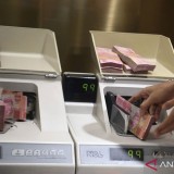 Rupiah Melemah Usai The Fed Turunkan Suku Bunga