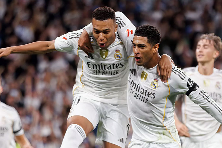 Kylian Mbappe merayakan gol yang dicetaknya bersama Jude Bellingham saat Real Madrid menghadapi Valencia di lanjutan Liga Spanyol. Dalam laga ini Mbappe mencetak dua gol.