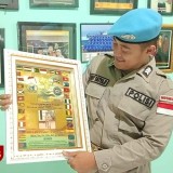 Raih 14 Gelar Akademik, Kisah Brigadir Endy, Polisi Jombang yang Tak Pernah Berhenti Belajar