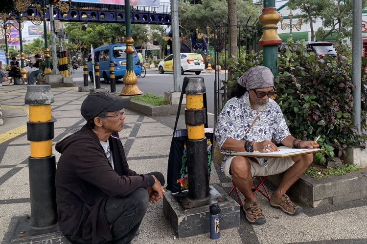Pramono-melukis-di-jalan-Kayutangan.jpg