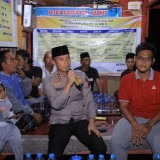 Kapolres Madiun Turun ke Pos Kamling Jatisari, Warga Diingatkan Bahaya Penipuan Online